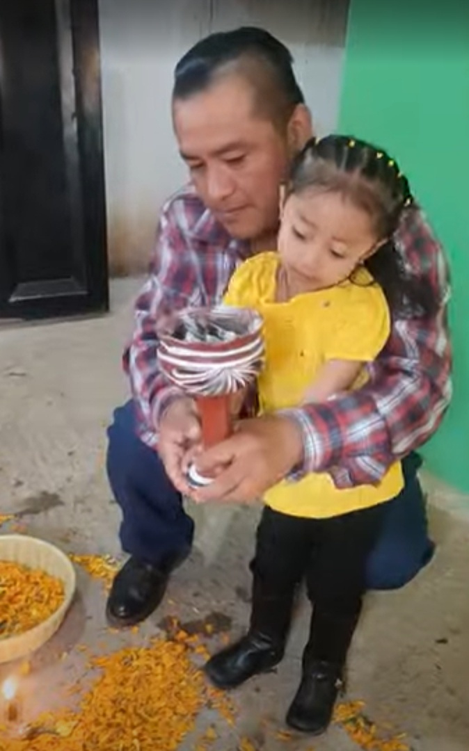 Figure 6. Sabina Cruz de la Cruz’s husband and daughter with the popoxcomitl. These two images illustrate both continuity and change. Photograph by Sabina Cruz de la Cruz.
