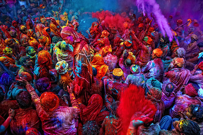 second day of Holi, people throw perfumed/ colored water and colored powder in celebration.