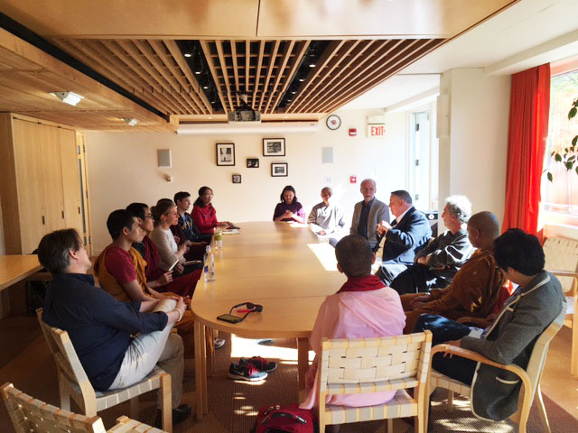 Picture of John Ross Carter and otthers sitting in the CSWR Conference Room