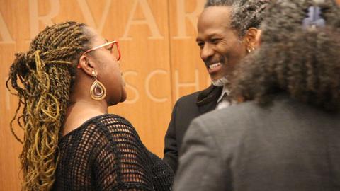two people in friendly conversation