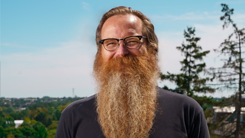 Brad Stoddard smiling into the camera