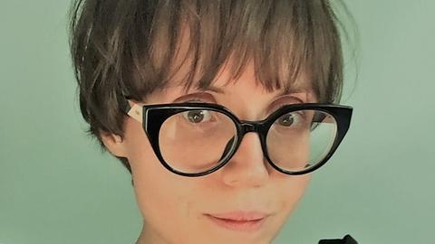 Anna Sierka looking into the camera