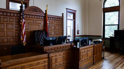 Wood panelled empty courtroom