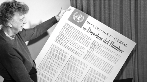 Eleanor Roosevelt holding copy of declaration of human rights