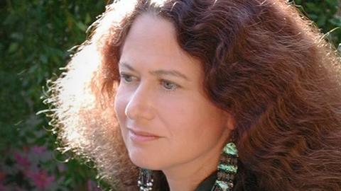 Jane Hirshfield looking off into the distance