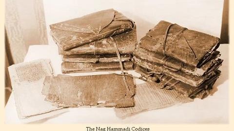 Ancient Nag Hammadi Codices stacked up.