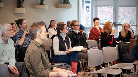 Participants listening to a lecture
