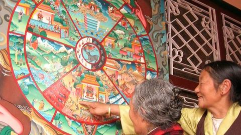 "Wheel of life Didactic." A delog teaches about the different realms in life and death as depicted in a mandala