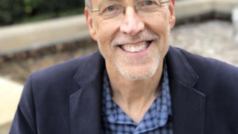 Author Bill Barnard smiles at the camera