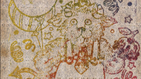 Photo of an acid blotter image of a bear