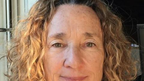 Photo of Jane Miller looking into the camera