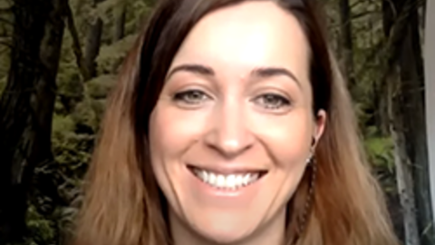 Natalie Dyer looking at the camera