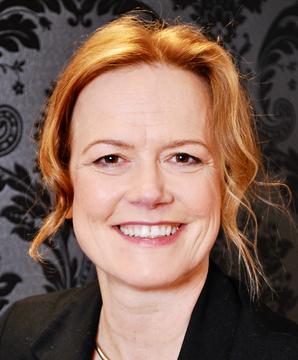Photo of Christine Hauskeller smiling into the camera