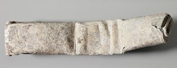 A lead curse tablet.