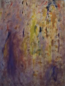 Abstract image of dotted, blurred colors in soft reds, oranges, and yellows