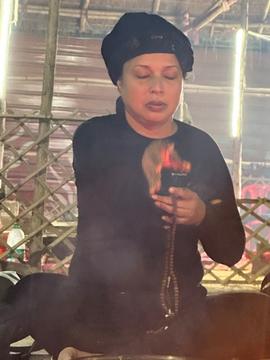Sravana Borkataky-Varma performing a ritual