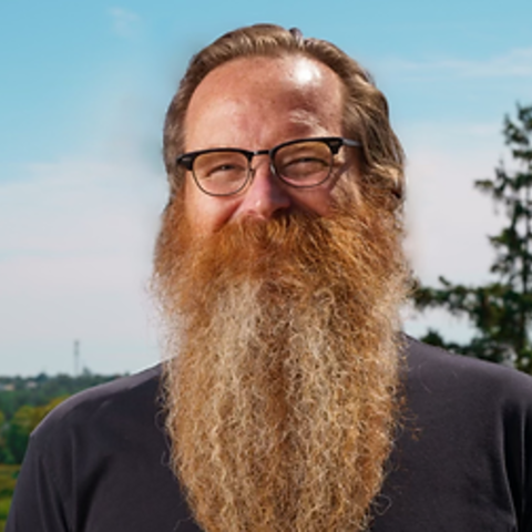 Brad Stoddard smiling into the camera