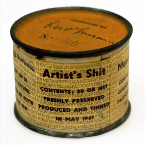 old metal tin panted yellow with "artist's shit" printed on side