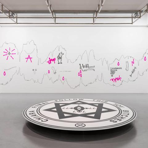 Chiara Fumai's exhibit with esoteric symbol at the center