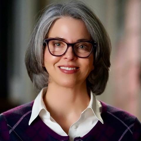 Elise Lemire smiling into the camera
