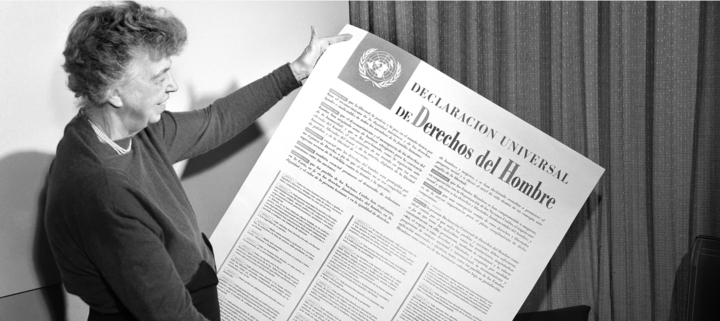 Eleanor Roosevelt holding copy of declaration of human rights