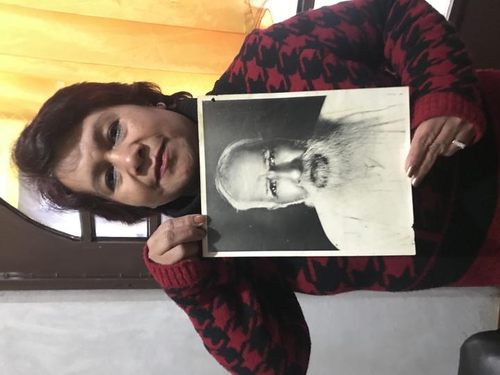 María de Jesús García Galván shows a photograph of her great-great-grandfather, Othon García, the first Municipal President of Huautla.