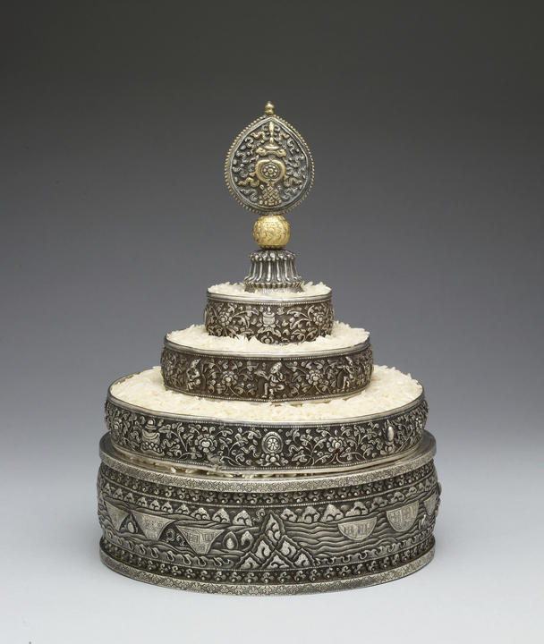 Grain mandala set consisting of five silver repoussé components with a decorative finial representing Mount Meru a de