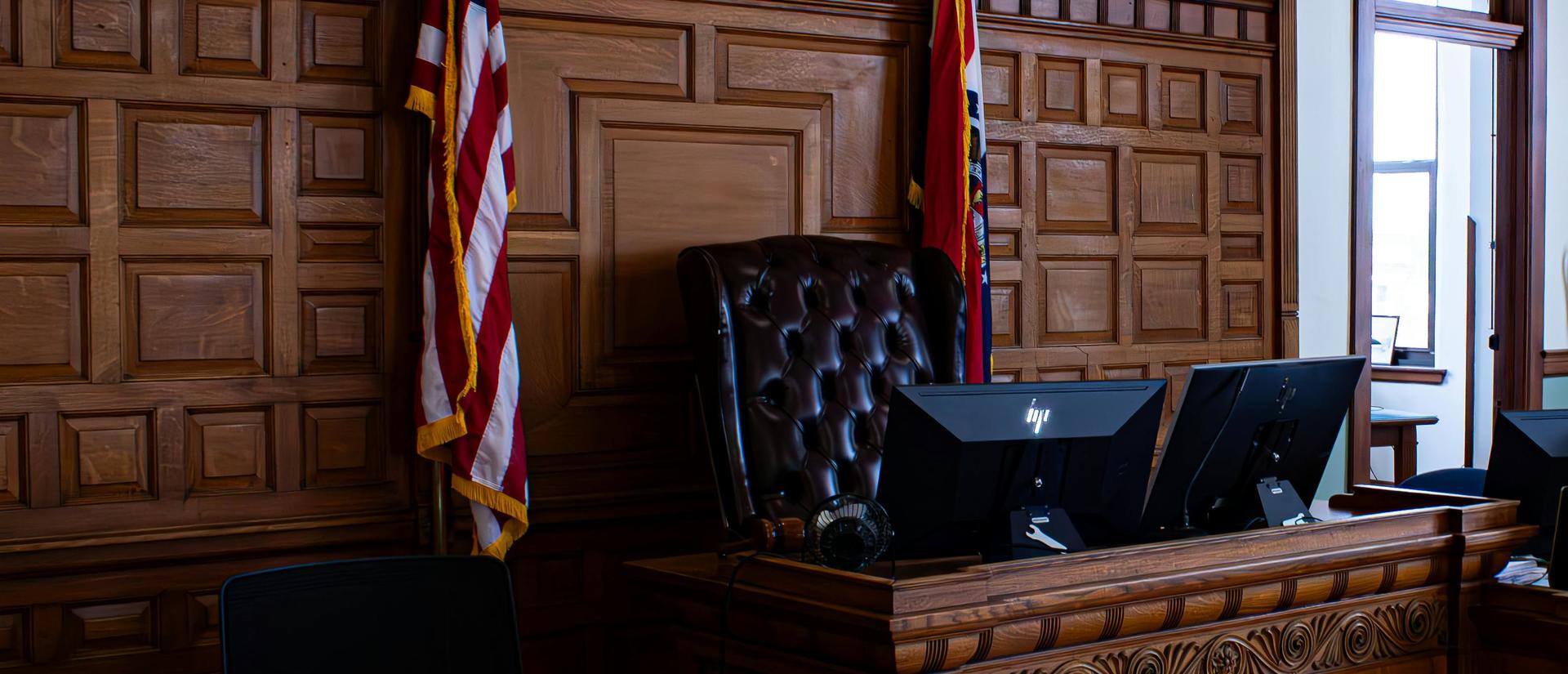 Wood panelled empty courtroom