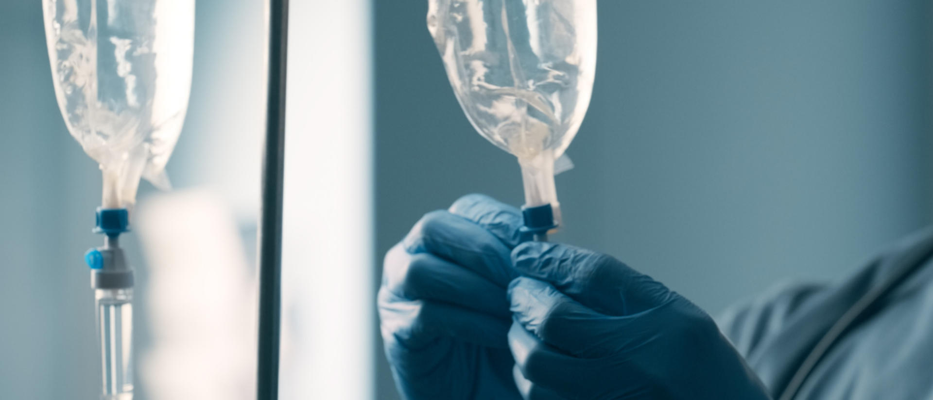 A medical scene with IV drip bags