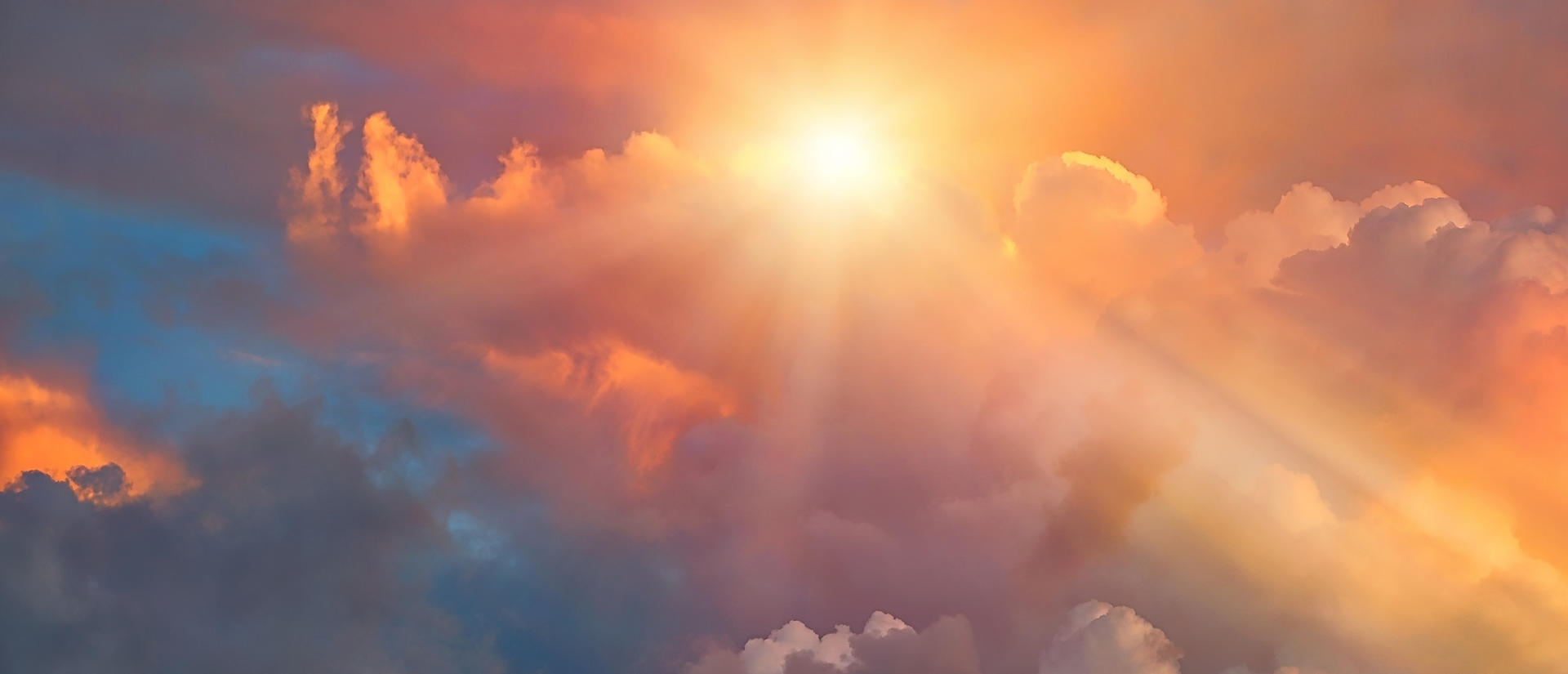 Sunlight streaming through the clouds