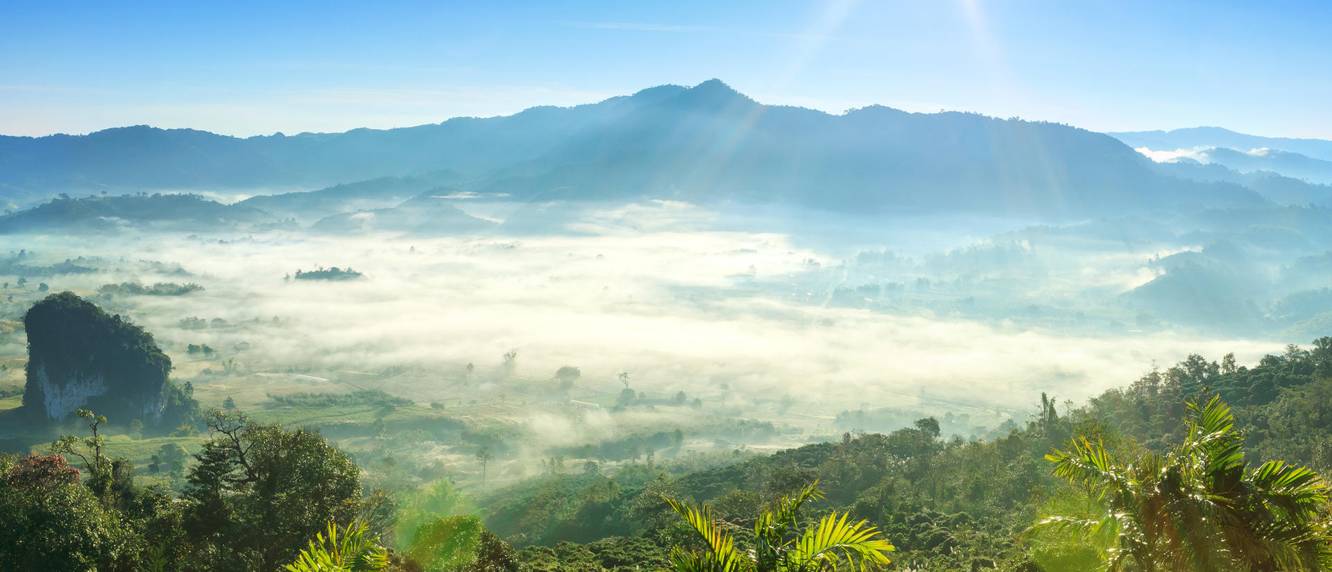Mountain landscape with light beams