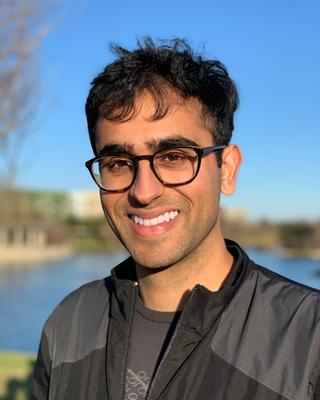 Alyan Daya smiling into the camera