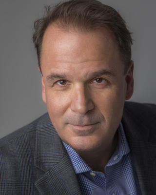 Peter Catapano looking into the camera