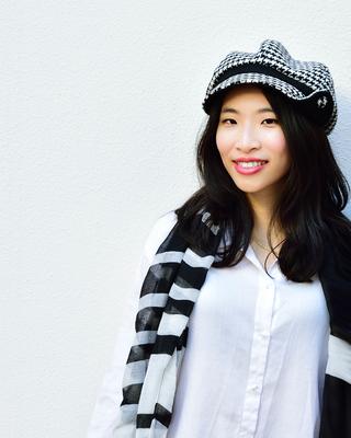 Michele Cheng smiling into the camera