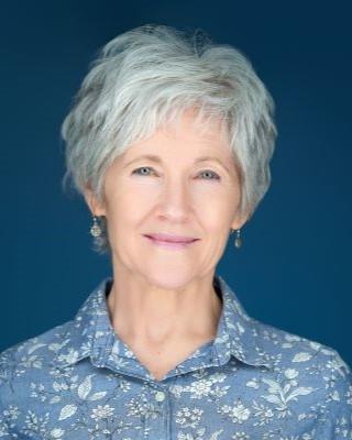 Photo of Laurie Sedgwick smiling into the camera
