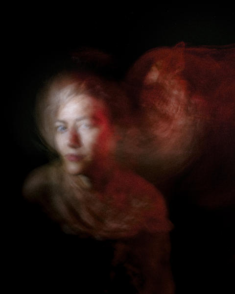 Artistic rendition of Jane Sheldon, blurred with red cloud-like cluster in the distance