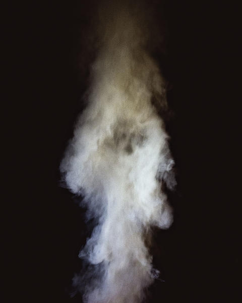 puff of smoke with black background